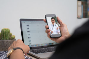 telehealth; patient seeing doctor on phone