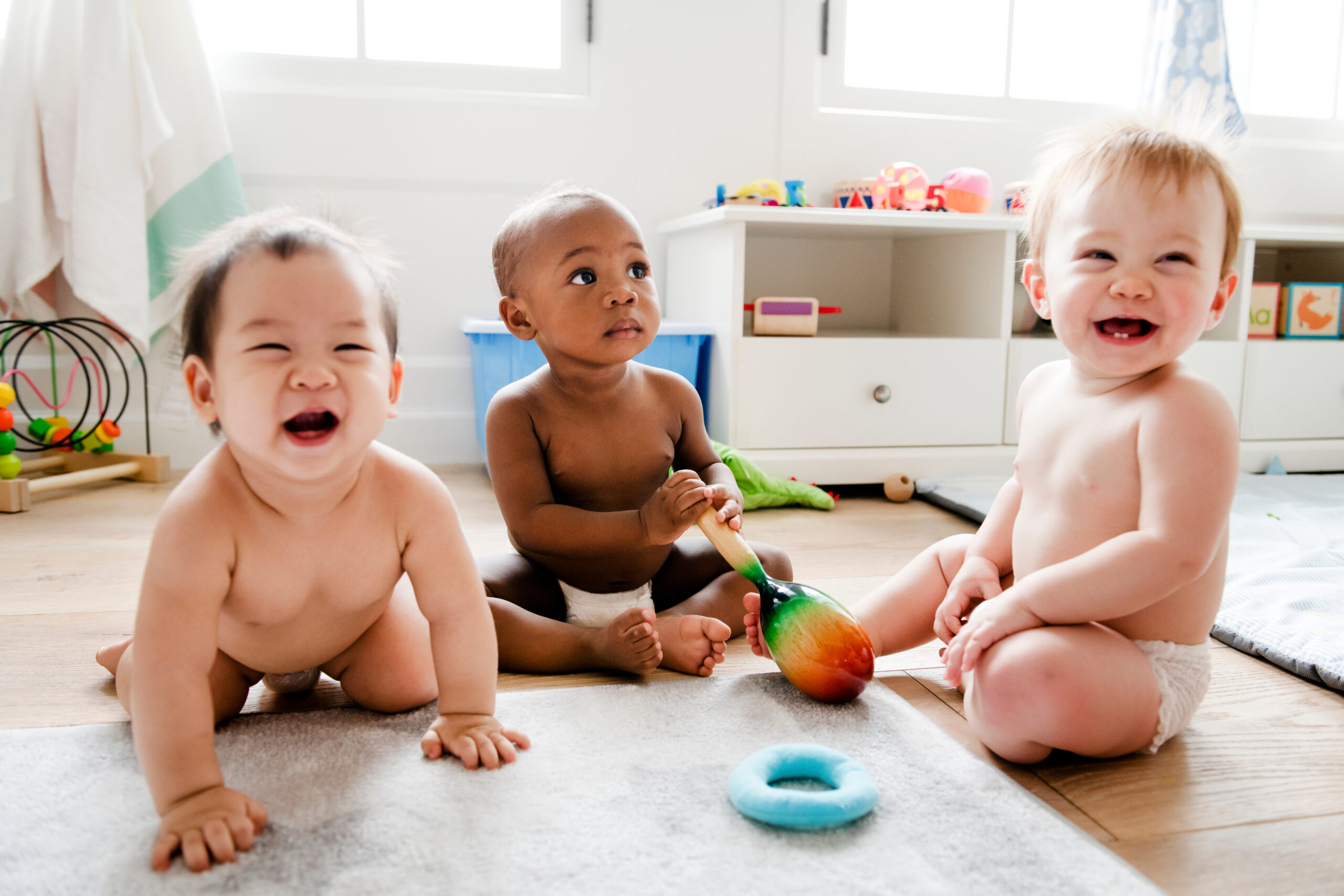 Diverse group of babies playing
