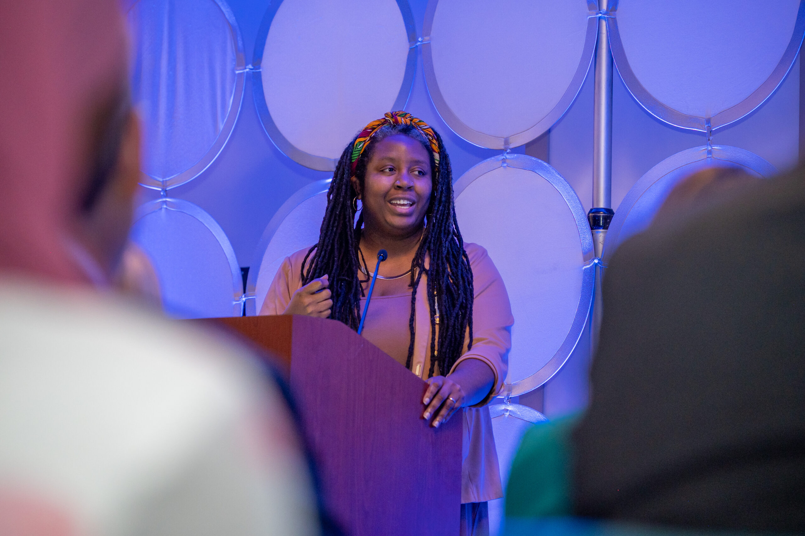 Jena Bradley delivers remarks at school to work graduation